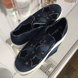 Distressed never before worn denim slip on